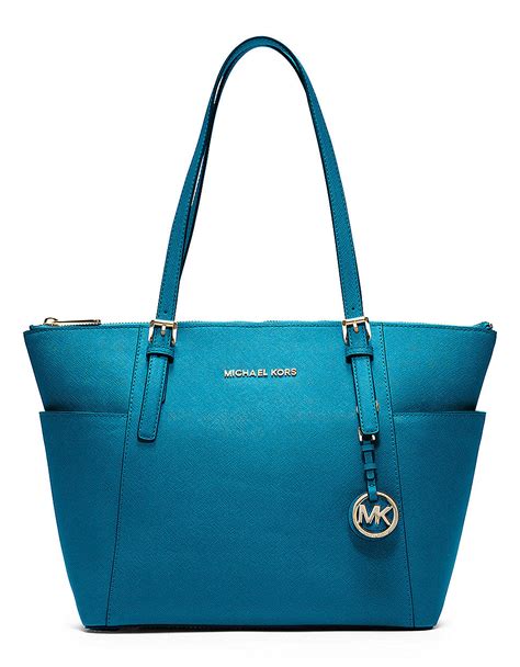 michael kors jet set travel turquoise leather tote|Michael Kors airplane print.